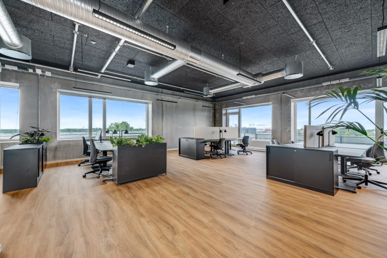 Furnished office H3.1 with desks and large windows on the 3rd floor