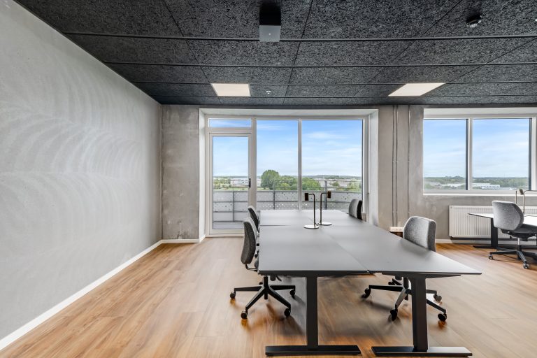 Office H5.1 with desks and large windows with views
